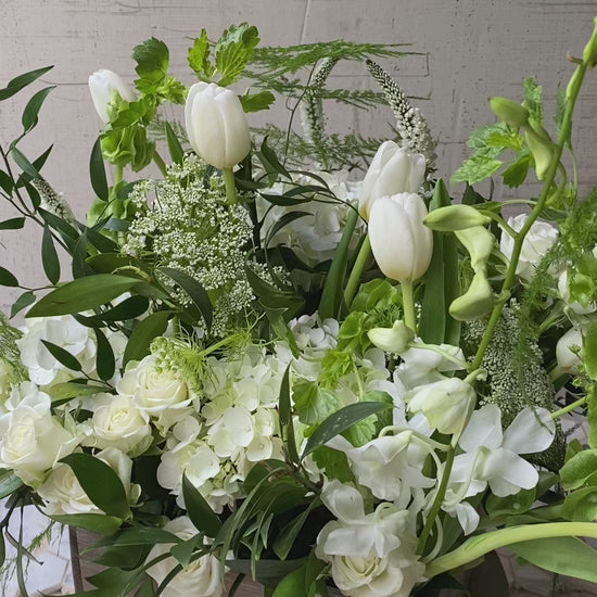 video of rotating Barton Creek Gardens box garden arrangement of white and green flowers